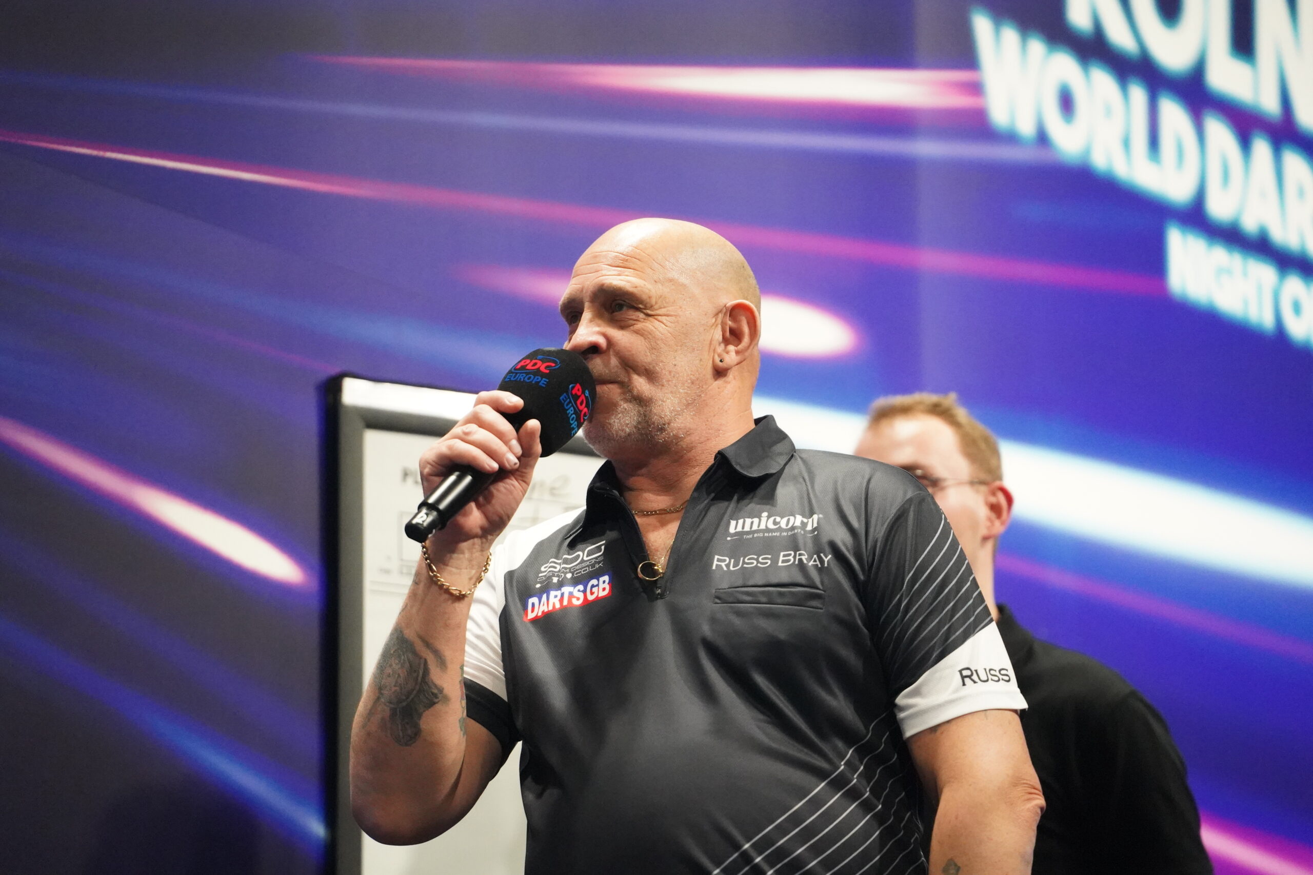 Russ Bray als Caller bei der Köln World Darts Gala.